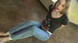Blonde girl wets jeans