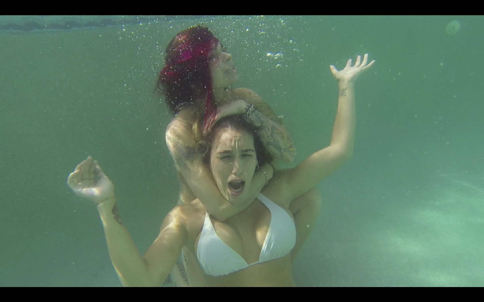 Girl fight underwater