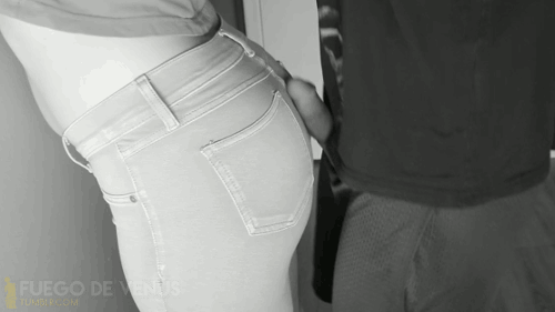 Spanking jeans ass